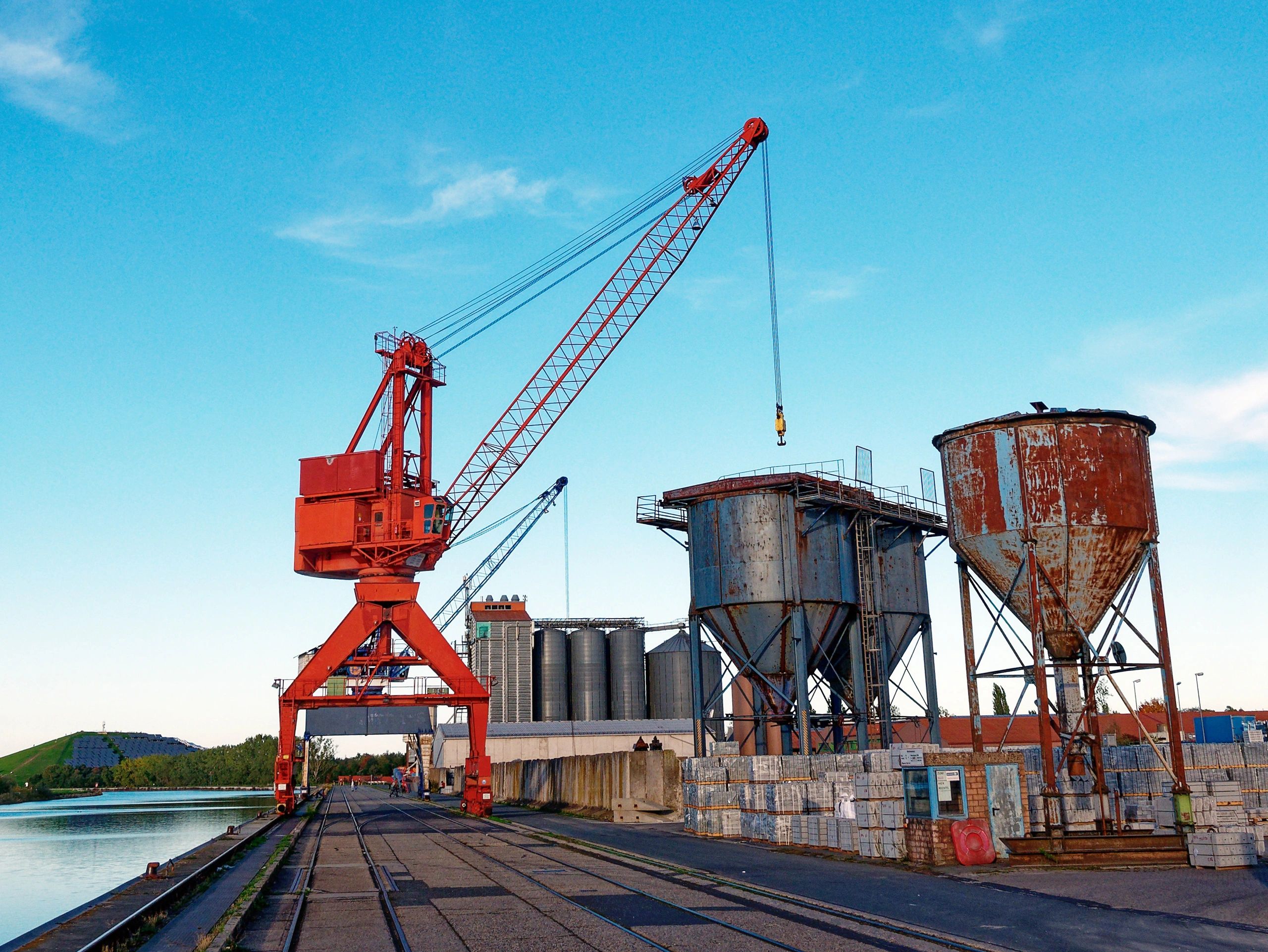 Industrial harbor crane representing export shipping